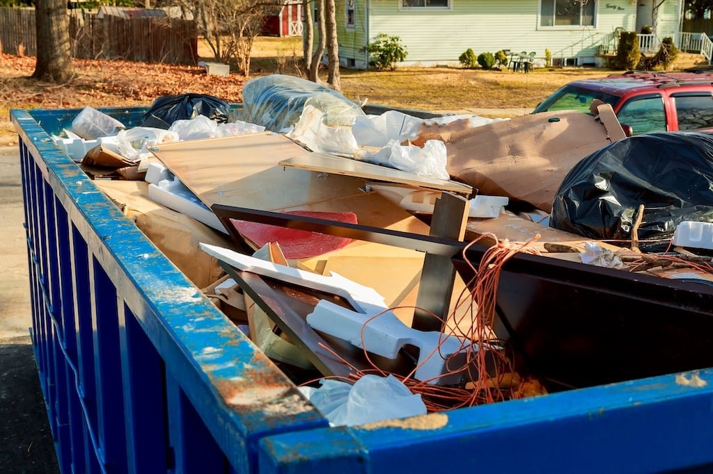 Team performing property cleanout and junk removal